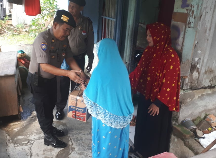 Program Polrestabes Berbagi Dengen Warga Kurang Mampu