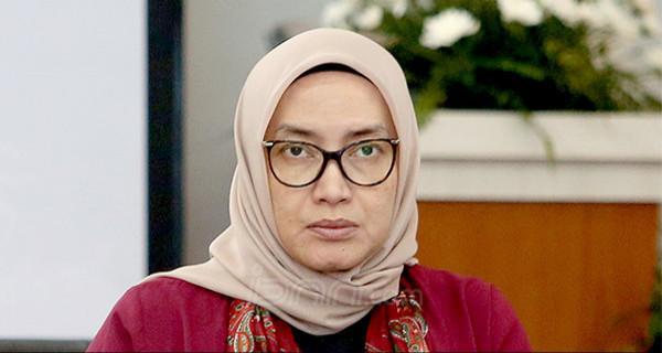 Evi Novida Ginting, Dipecat