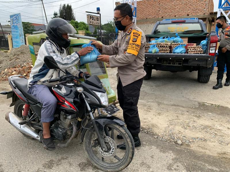 Bhayangkari Polres Gayo Lues Bagikan Sembako