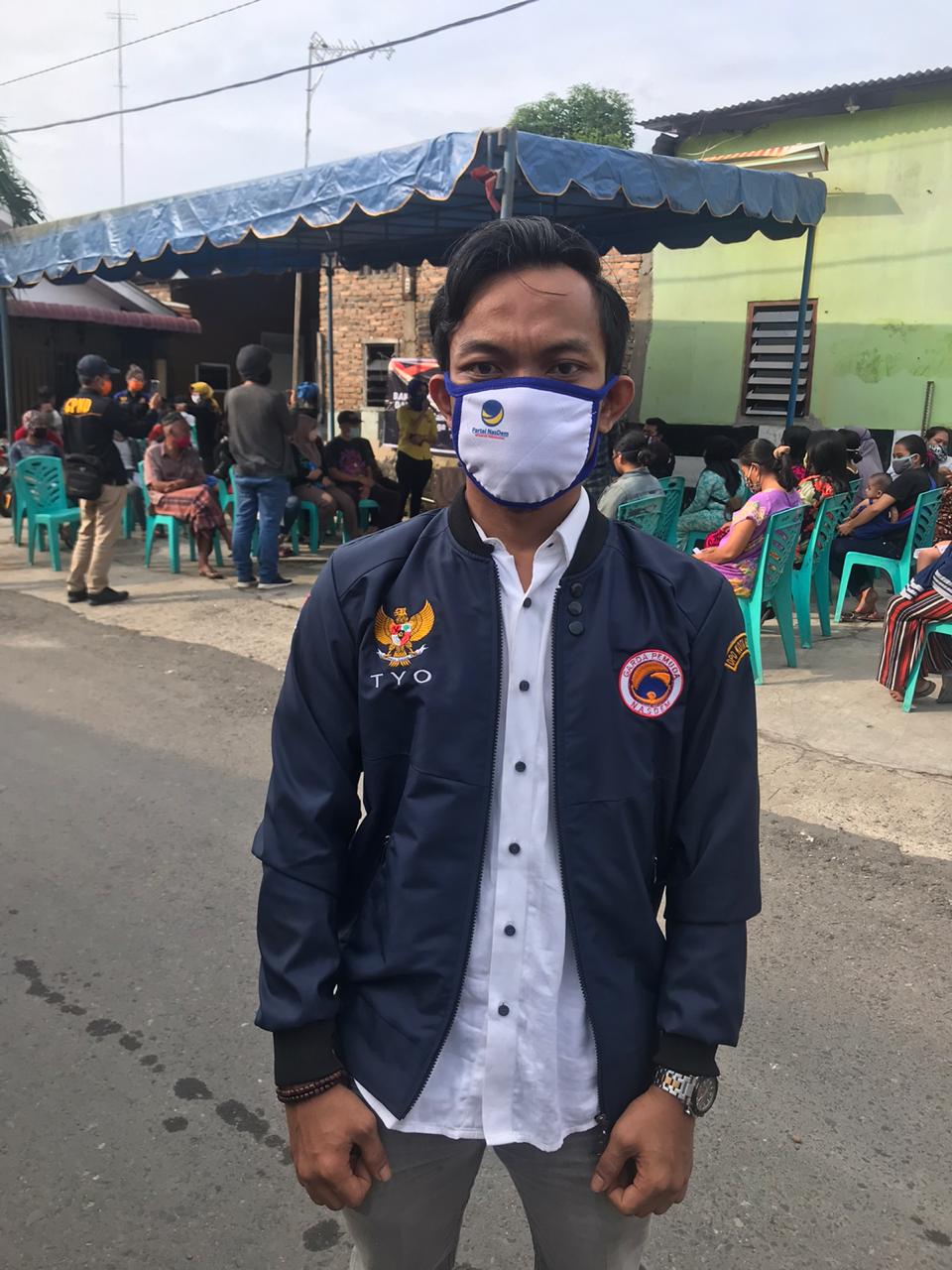 Peringati HUT ke-9, Garda Pemuda NasDem Medan Berbagai Sembako ke Masyarakat