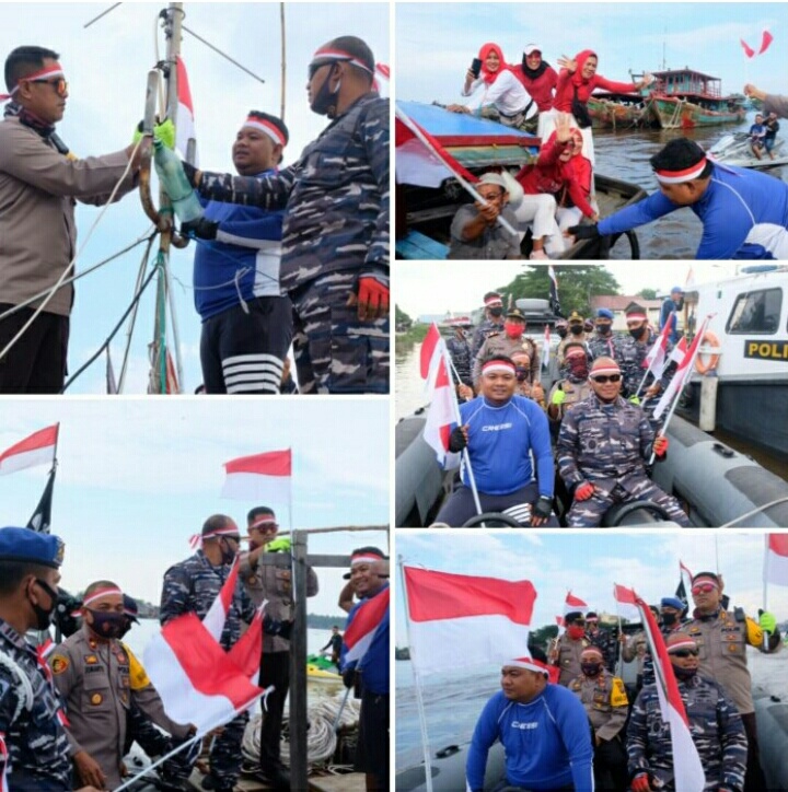 TNI-Polri dan Pemko Tanjung Balai bagikan 100 Bendara Merah Putih kepada Masyarakat Nelayan
