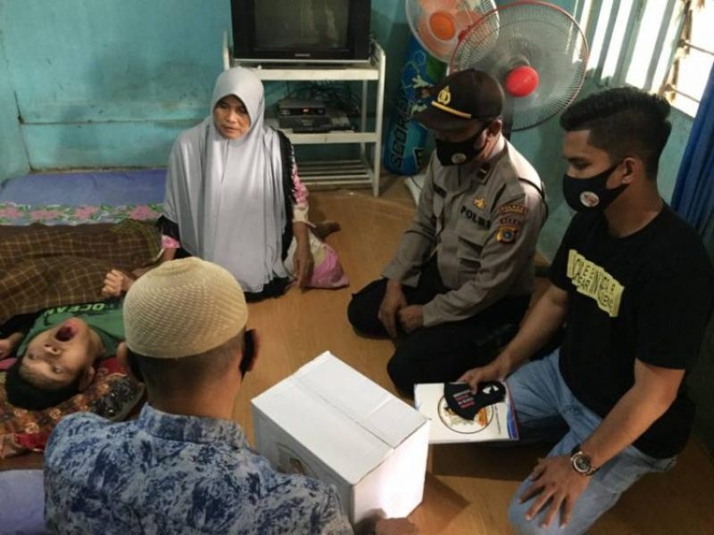 Menjemput ‘Kue Surga’ Kapolres Lhokseumawe Berikan Bansos di 2 Kecamatan