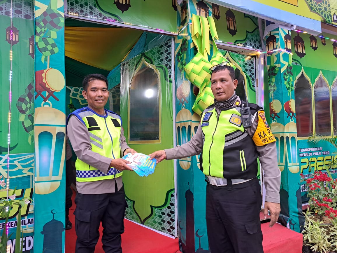Jelang Idul Fitri 1444 Hijriah, Satlantas Polrestabes Medan Bagikan Spanduk